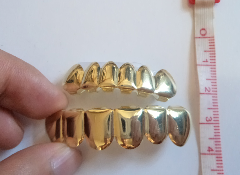 

Wholesale-Grillz REAL GOLD PLATED HIPHOP TEETH GRILLZ TOP & BOTTOM GRILL SET