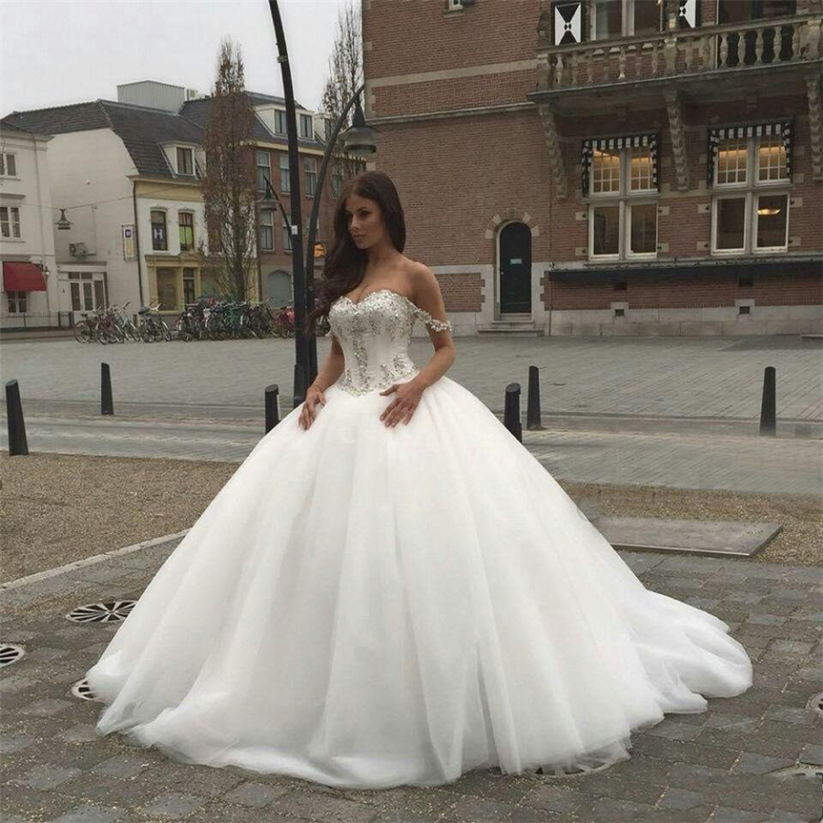 

Sweetheart Beaded Crystals Backless Elegant Bridal Gowns With Spaghetti Straps New Saudi Arabic A-line Basque Waist Wedding Dresses, Pink