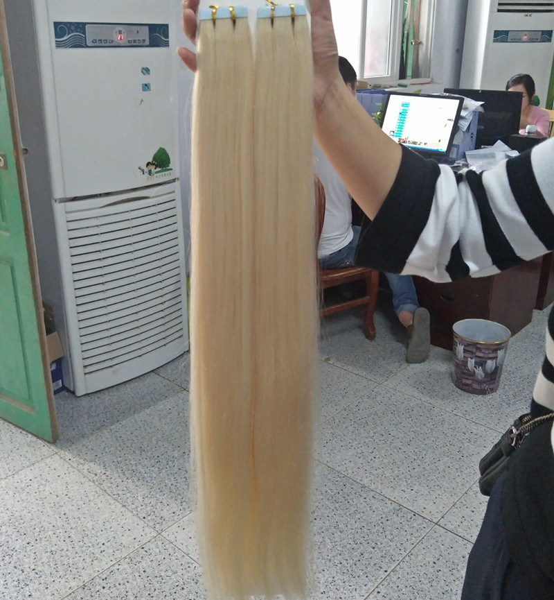 

Grade 10A---Double Drawn Blonde Color 613 Pu tape in hair extension 100% Human remy hair 12''-26'' Weight 2 g/s 80g/pack 40pcs, free DHL