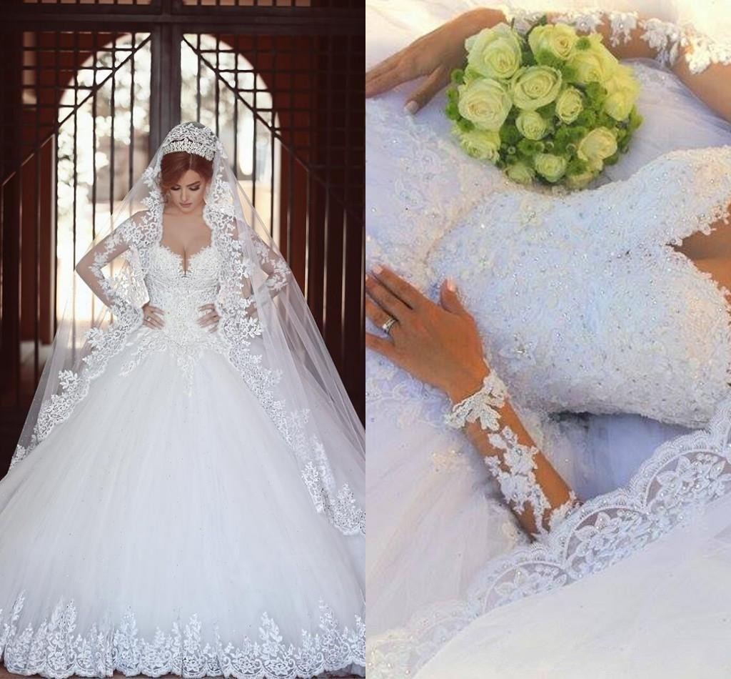 

2016 Cheap Arabic A Line Wedding Dresses Illusion Neck Lace Appliques Beads Tulle Long Sleeves Chapel Train Plus Size Formal Bridal Gowns, Ivory