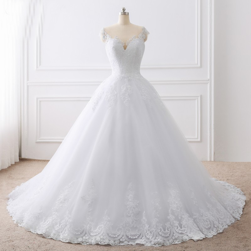 

Sheer Bodice with Crystals Ball Gown Wedding Dresses Lace Appliques Sexy Bridal Gowns Vestido De Novias Princess Luxury Cathedral Train, Same as image