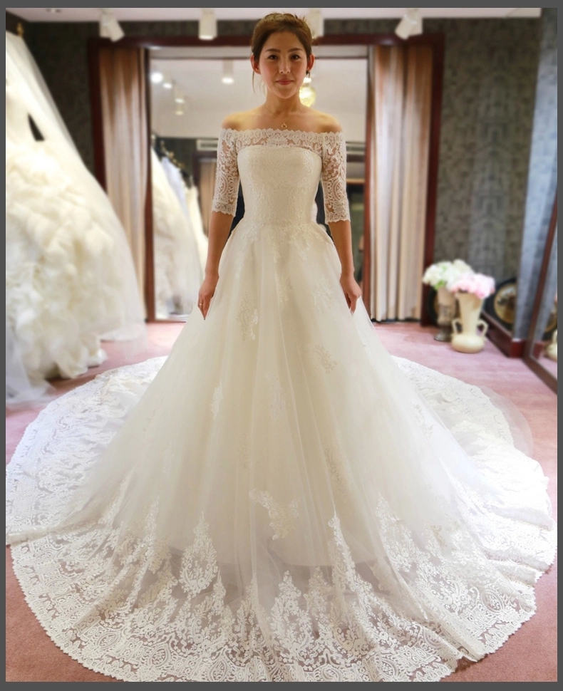 

Long Cathedral Train Sexy Wedding Dress White Ivory Vestido De Novia Lace Applique Off The Shoulder Half Sleeve Bateau Neck Bridal Gown