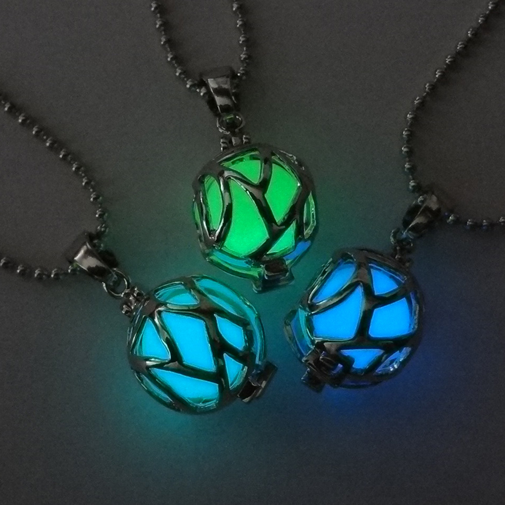 

It can open hollow luminous football-shaped pendant necklace luminous glowing pearl necklace jewelry for men and women