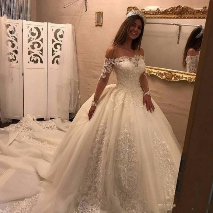 

Luxury 2017 Wedding Dresses Off Shoulder Illusion Long Sleeves Lace Appliques Beads Ball Gown Puffy Skirt Cathedral Train Bridal Gowns, White