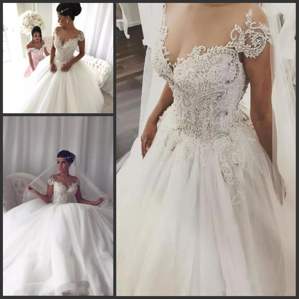 

2017 Vintage Arabic A Line Wedding Dresses Lace Appliques Crystal Beaded Sequins Sweetheart Cap Sleeves Low Back Wedding Bridal Gowns, White