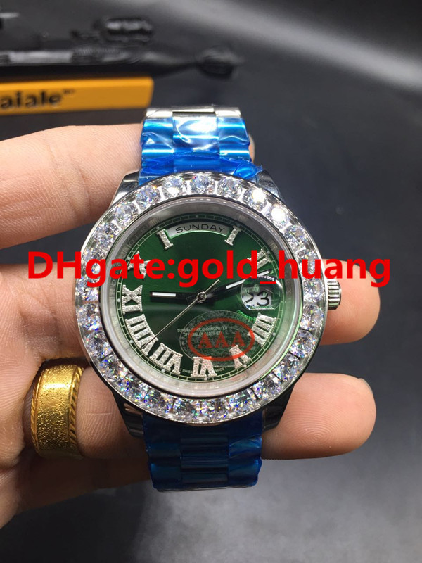 Silver shell, green dial