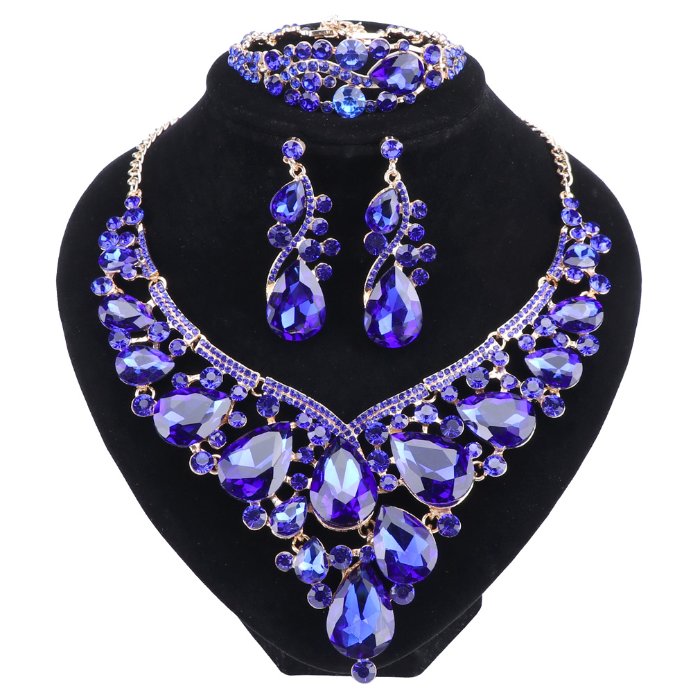 Le Nouveau Bijoux De Mode Or-couleur Cristal Strass Collier Boucles D'oreilles Bracelet Anneau Ensemble Femmes Ensembles De Bijoux De Mariage De