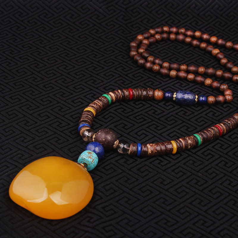 

Wholesale- fashion Evade Peace High imitation beewax ethnic necklace yellow,Nepal jewelry handmade sandalwoods long vintage necklace