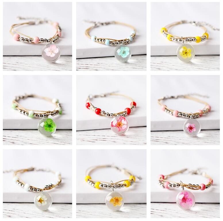 

Hot sale Peach Blossom Glass Pendant Dry Flower Plant Specimen Gui Gui Bracelet FB501 mix order 20 pieces a lot Slap & Snap Bracelets