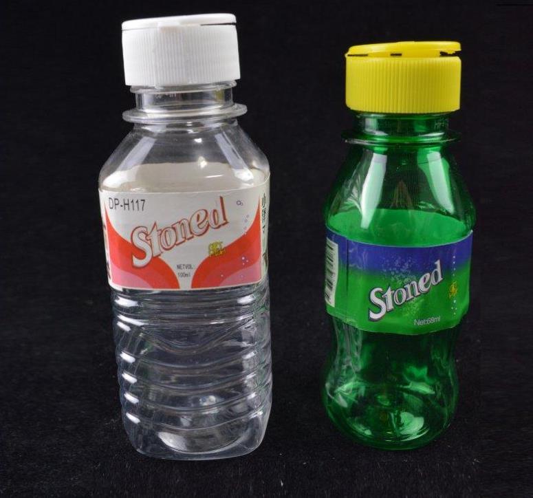 

Mini Oil Rig Portable Smoking 10mm joint Stoned Spring Water Mineral Water Bottle Shaped 4" inch with Hose Free Curved Bucket Bowl