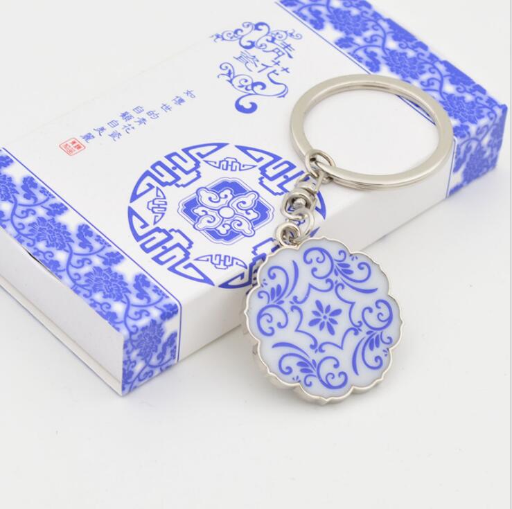 Nouvelle arrivée bleu et porte-clés en porcelaine blanche chaîne de création de petites clés en métal cadeau KR199 Porte-clés pour mélanger 20 pi