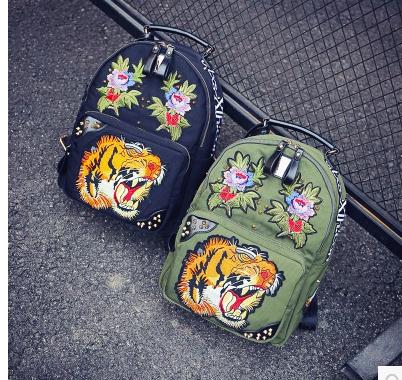 

Korean goods JTXS genuine shoulder bag female Korean version of the backpack tide cloth personality tiger head embroidery Oxford spinning, Black