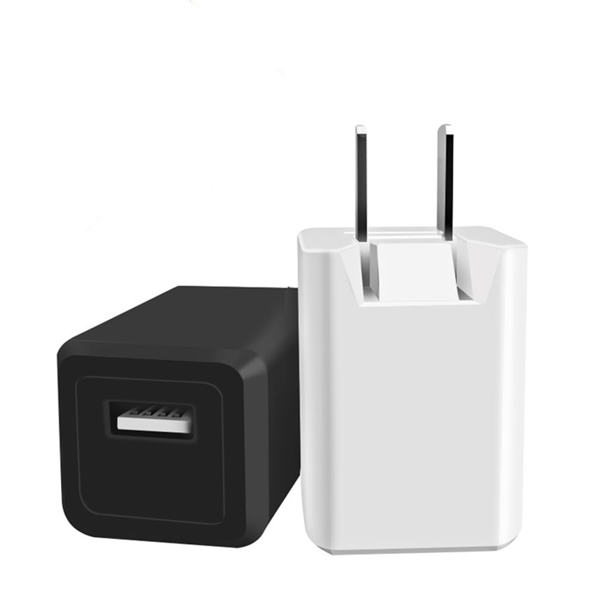 

Mobile phone charger manufacturers selling 5 v 1 a fold-down charger environmental PE and abs head pure copper feet usb charger