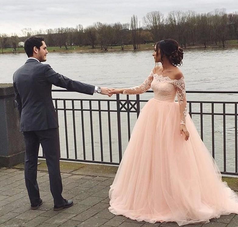 blush pink long sleeve wedding dress