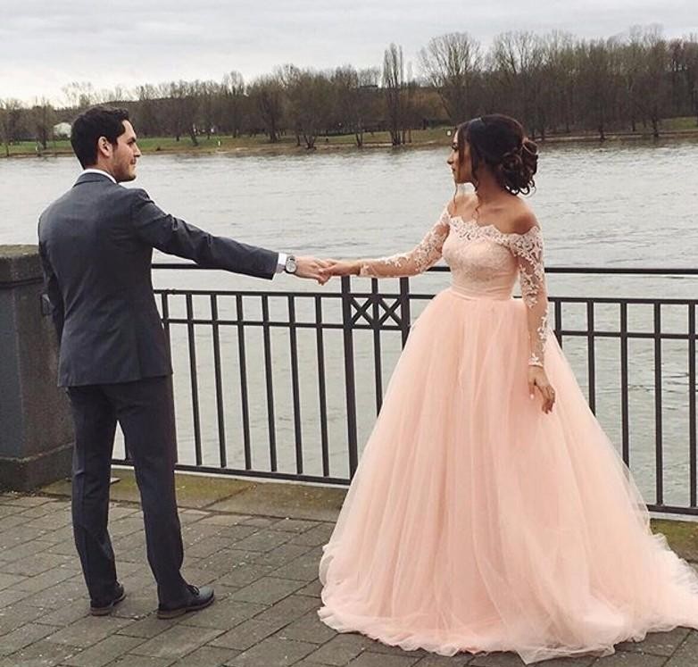 long sleeve blush wedding dress