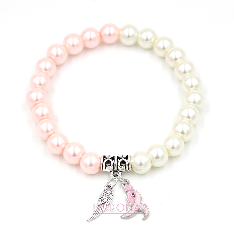 En gros Livraison Gratuite Nouvelle Arrivée Perle Bracelet Sensibilisation Au Cancer Du Sein Ailes D'ange Ruban Rose Charmes Bracelet Bijoux pour