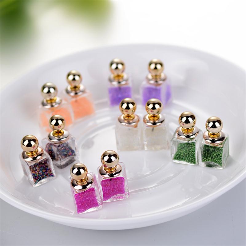 

dry flower glass stud earrings Double side Crystal quicksand ear stud fashion design perfume bottle ear stud