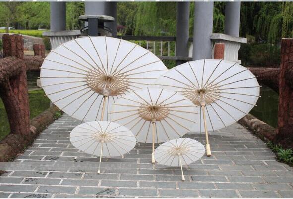 

2018 bridal wedding parasols White paper umbrellas Chinese mini craft umbrella 4 Diameter:20,30,40,60cm wedding umbrellas for wholesale