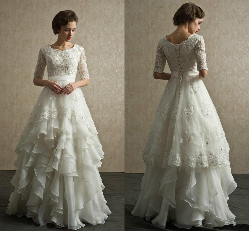 

Custom Made Vintage Wedding Dresses 2019 Half Sleeves Beaded Applique Lace Up Back Wedding Gowns Tiered Organza Bridal Dress China, Dark navy