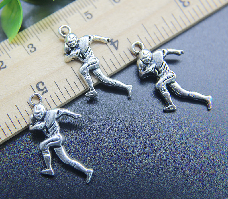 

Wholesale 100pcs Rugby Player Charms Pendant Retro Jewelry Making DIY Keychain Ancient Silver Pendant For Bracelet Earrings 29*15mm