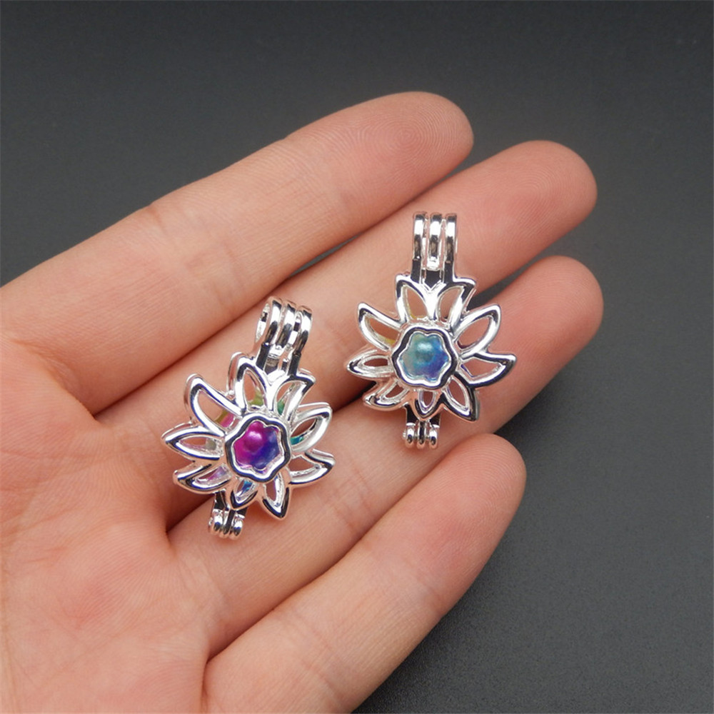 In 2018, the new style bright silver sunflower pearl cage 10pcs jewelry makes pearl cage pendant essence oil diffusion pearl.
