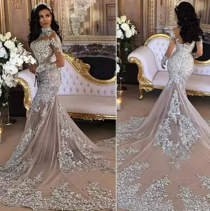 

Luxury 2018 Mermaid Wedding Dresses Sheer High Neck Long Sleeves Shiny Beading Lace Appliqued Champagne Tulle Arabic Bridal Gowns Real Image, White