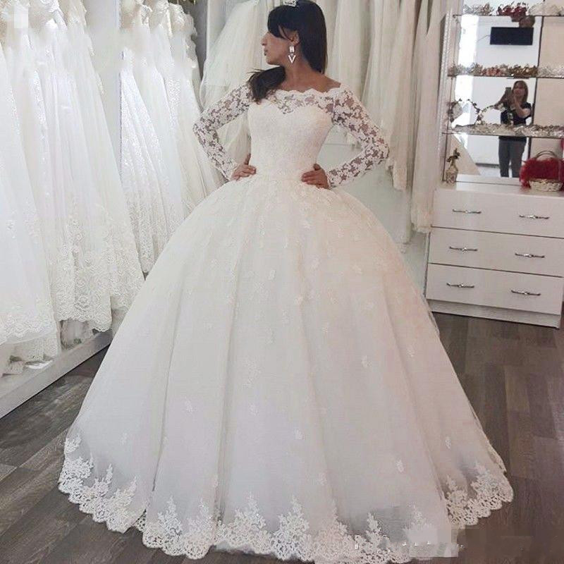 Robe de mariée à manches longues robes de mariée avec boutons de dentelle longueur de plancher Femmes arabes longues robes de mariée et robe de m