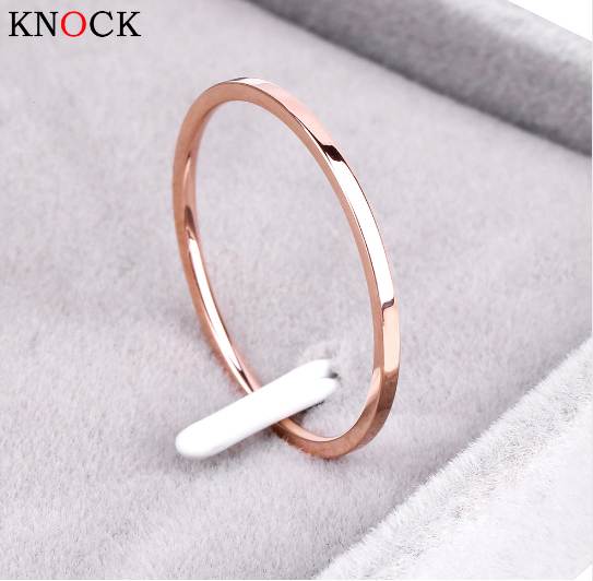 

Knock ( 1.2 MM ) Promotion Titanium Steel Rose Gold Color Anti-allergy Smooth Couple Wedding Ring Woman Man Fashion Jewelr
