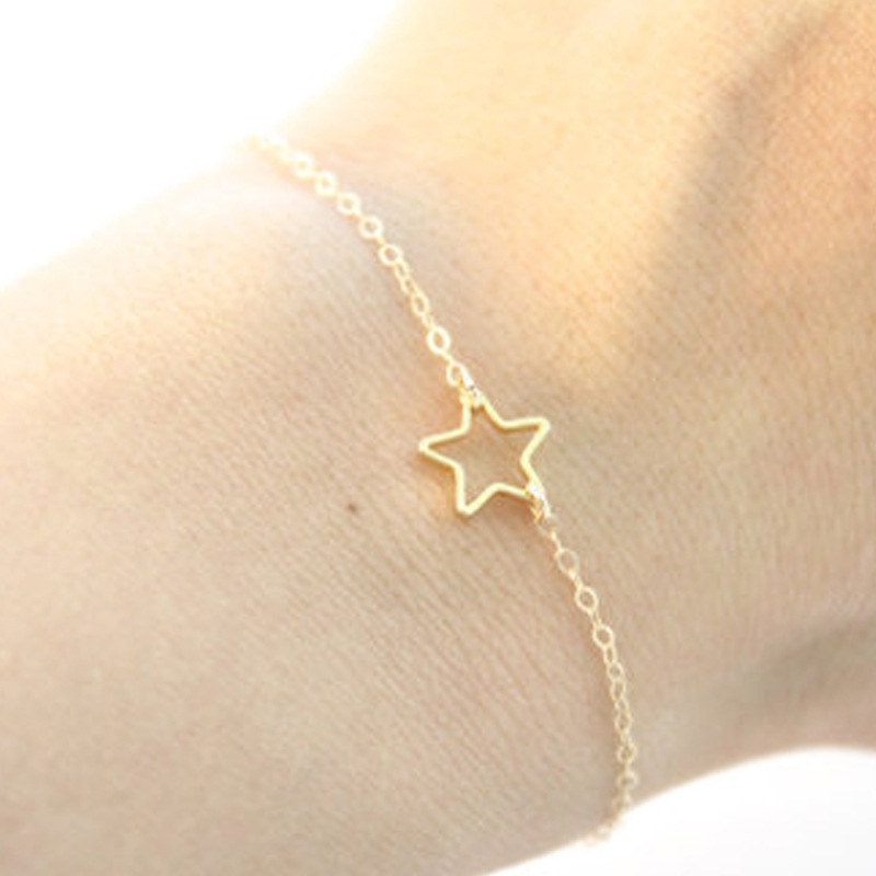 

Europe and the United States personality fashion simple hollow five-pointed star, bow, pearl, hexagonal star bracelet jewelry