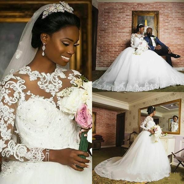

2018 New African Ball Gown Wedding Dresses Jewel Neck Long Sleeves Lace Appliques Beads Crystal Court Train Plus Size Formal Bridal Gowns, White