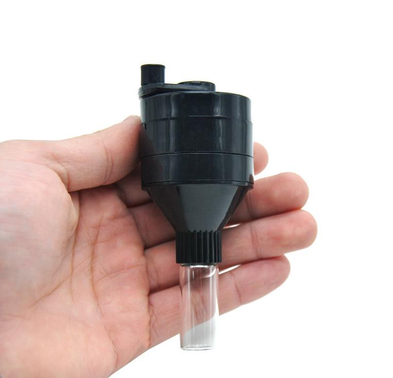

Plastic manual cigarette lighter, folding plastic smoke cutter, metal smoking implement grinder.