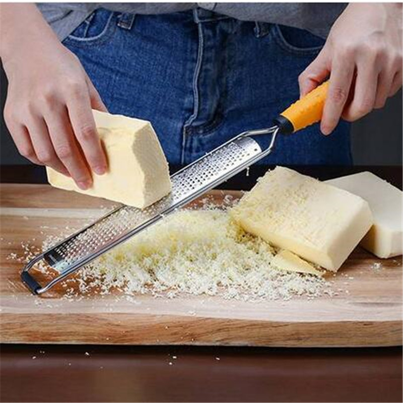 

Wholesales Citrus Lemon Zester Cheese Ginger Garlic Nutmeg Chocolate Grater Razor-Sharp Stainless Steel Blade + Protect Cover