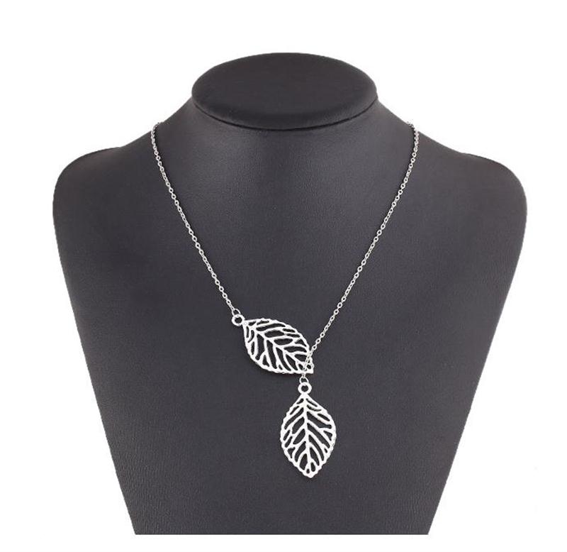 

creative women jewelry Vintage Punk necklace Gold And Silver Hollow Two Leaves Pendant Necklace For Women
