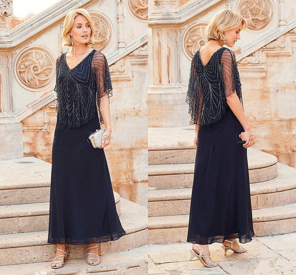 

2023 Mother Off Bride Dresses Chiffon Navy Blue V Neck Crystal Beading Short Sleeves Tea Length With Wrap Cape Plus Size wedding guest dress