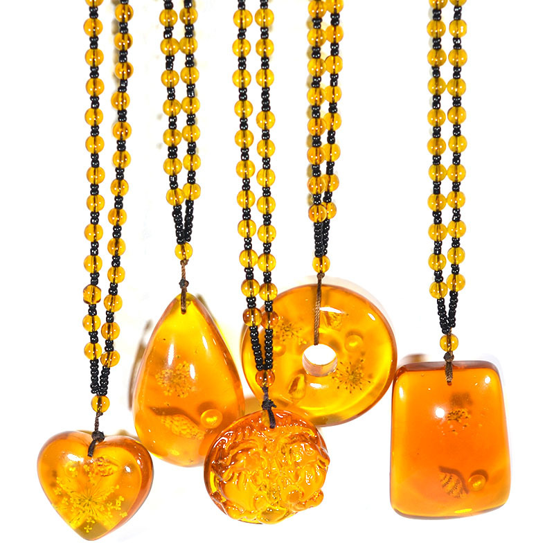 

New 5 color Brazilian natural plant fossil amber necklace peace buckle heart-shaped drop pendant necklace wholesale