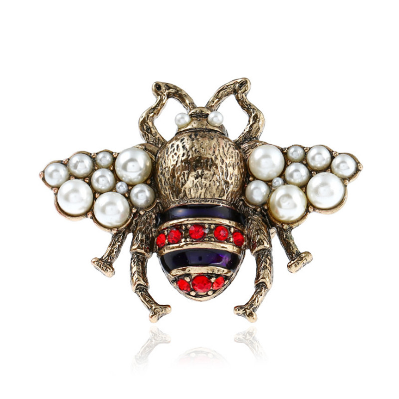 

Europe and America New Trendy Men Women Fashion Ring Gold Plated Rhinestone Pearl Bee Ring Nice Gift for Friends NL-711