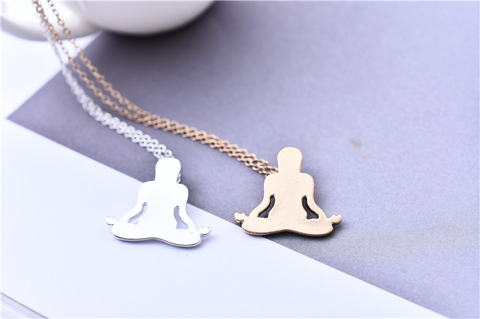 

Popular new European and American religious pendant alloy yoga key body bright face clavicular necklace lovely meditation figure patter