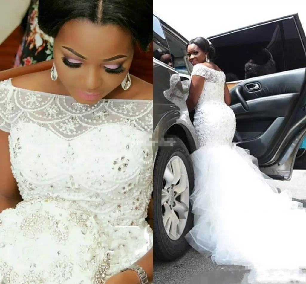 

African Nigerian 2018 Plus Size Mermaid Wedding Dresses Off Shoulder Short Sleeves Beading Top Ruffles Long Train White Tulle Bridal Gowns
