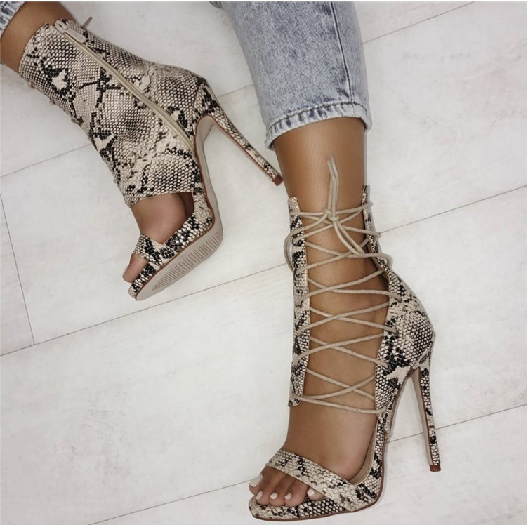 

2018 New list spring European and American fine 12cm high-heeled genuine leather shoes cross strap hollow serpentine cool women boots