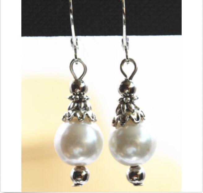 Un PAR PLATA TIBETANA Y NEGRO perla de cristal pendientes de Corazón Colgantes Nueva.