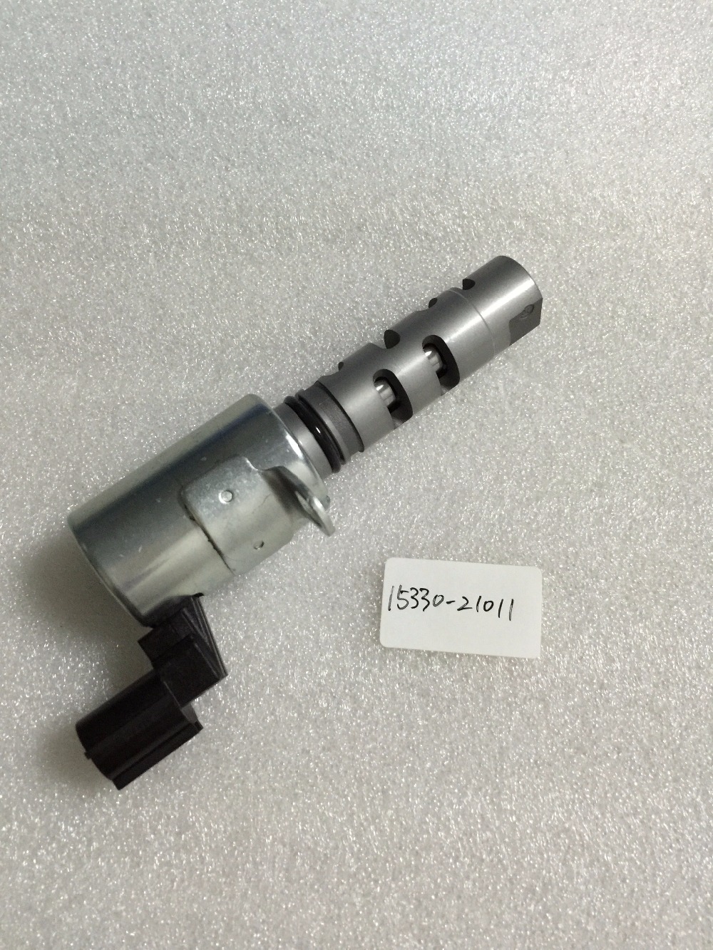 

15330-21011 1533021011 camshaft timing oil control valve assy variable valve for TOYOTA Prius Y aris 1.5 1nz 1NZFE