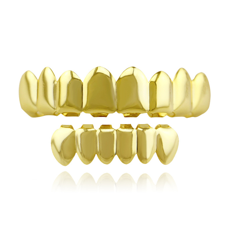 

Hot Sale Tooth Braces Tooth Gold Electroplating Fashionable Teeth Grillz Set Teeth Socket Shiny False Teeth for Rapper Hiphop