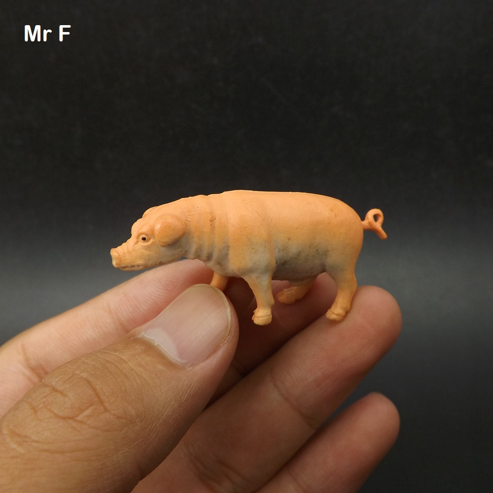 mini plastic pigs
