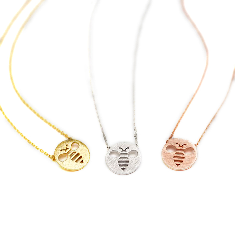 

Fashion bees pendant necklaces Lovely circle hollow out the bees pendant necklaces The bee shadow charm necklaces for women, Silver