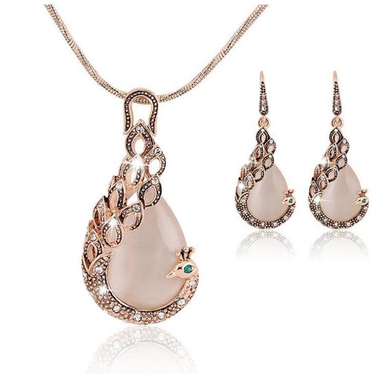 

Europe and the United States and creative peacock jewelry set hot selling Necklace Earrings two sets of wholesale, Rose red