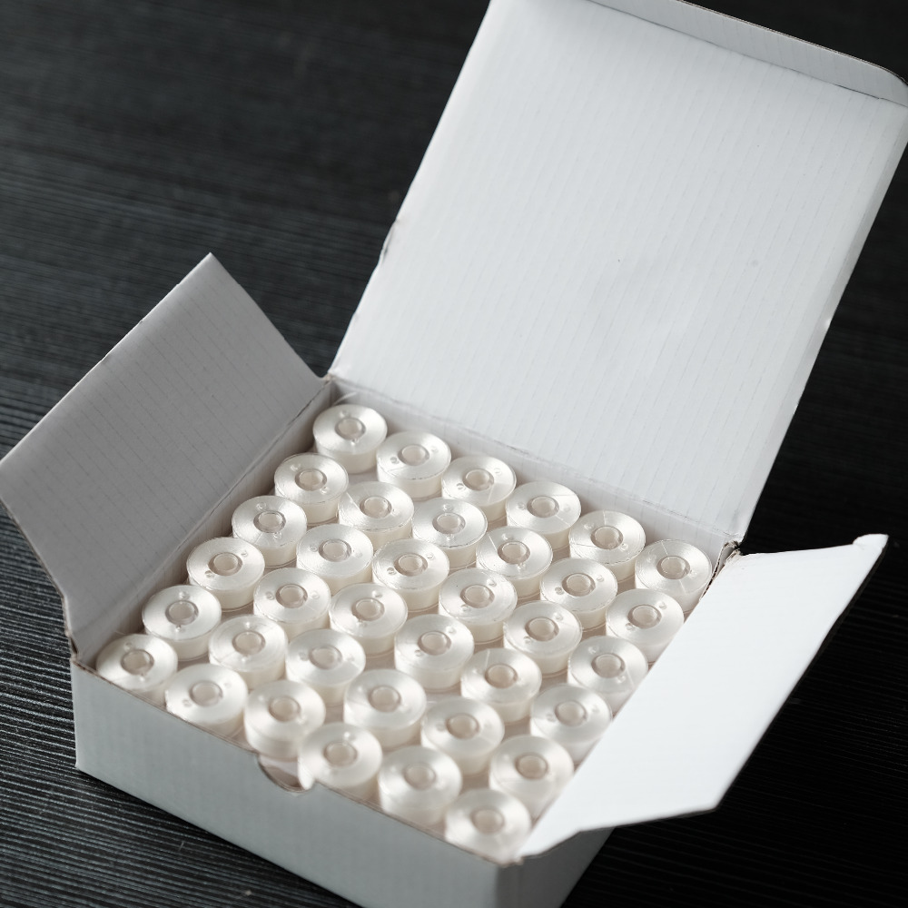 

144pcs White color Plastic Sided L Size Prewound Bobbin Thread Machine Embroidery Thread