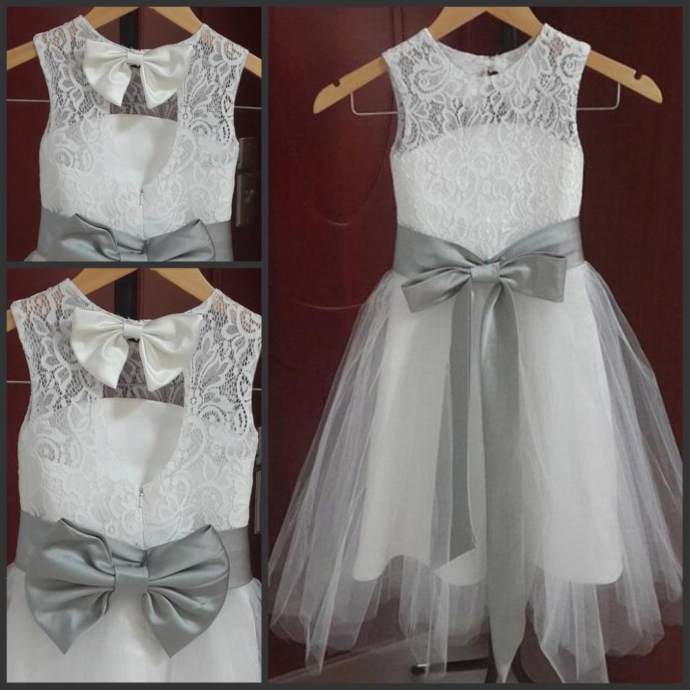 white flower girl dress with grey sash