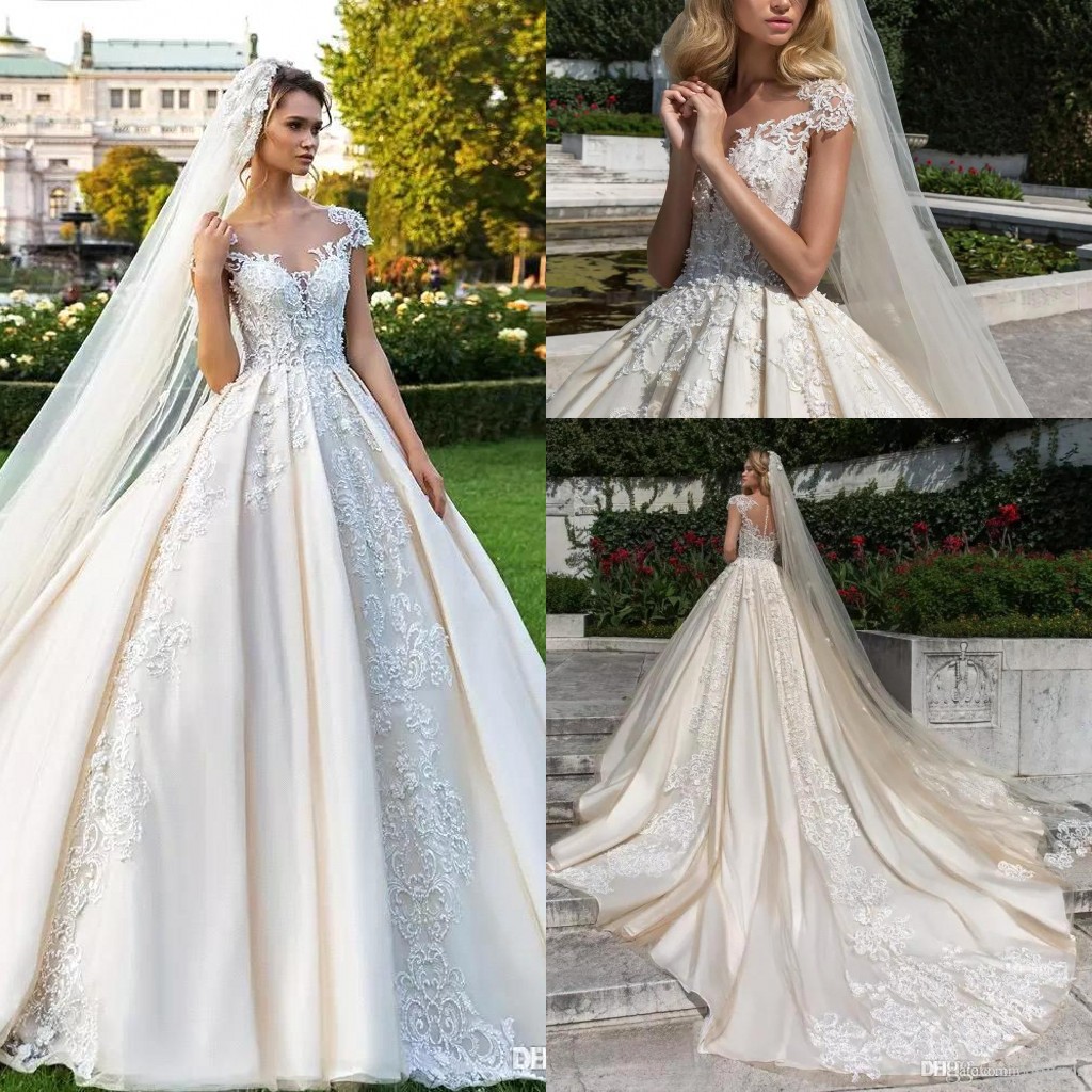 

Elegant Champagne Capped Sleeves Lace Wedding Dresses Satin Applique A Line Court Train Illusion Back Bridal Gowns With Covered Button