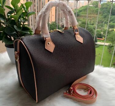 

brown Vintage collection of old flower handbags made of iconic canvas shoulder bags and messenger bags are all classic