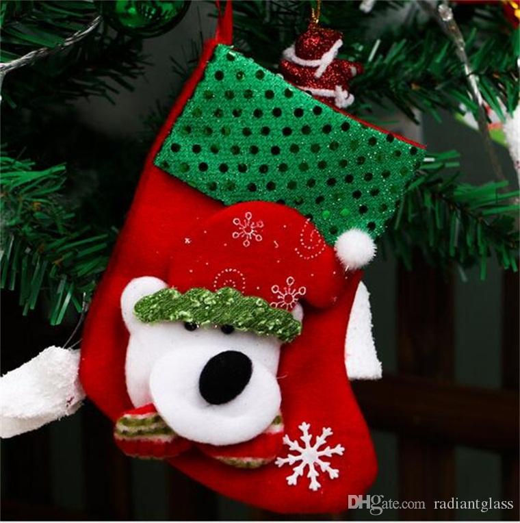 

Hot sales Christmas decoration Stocking Wholesale Embroidered Cute Santa Claus Pattern for Party